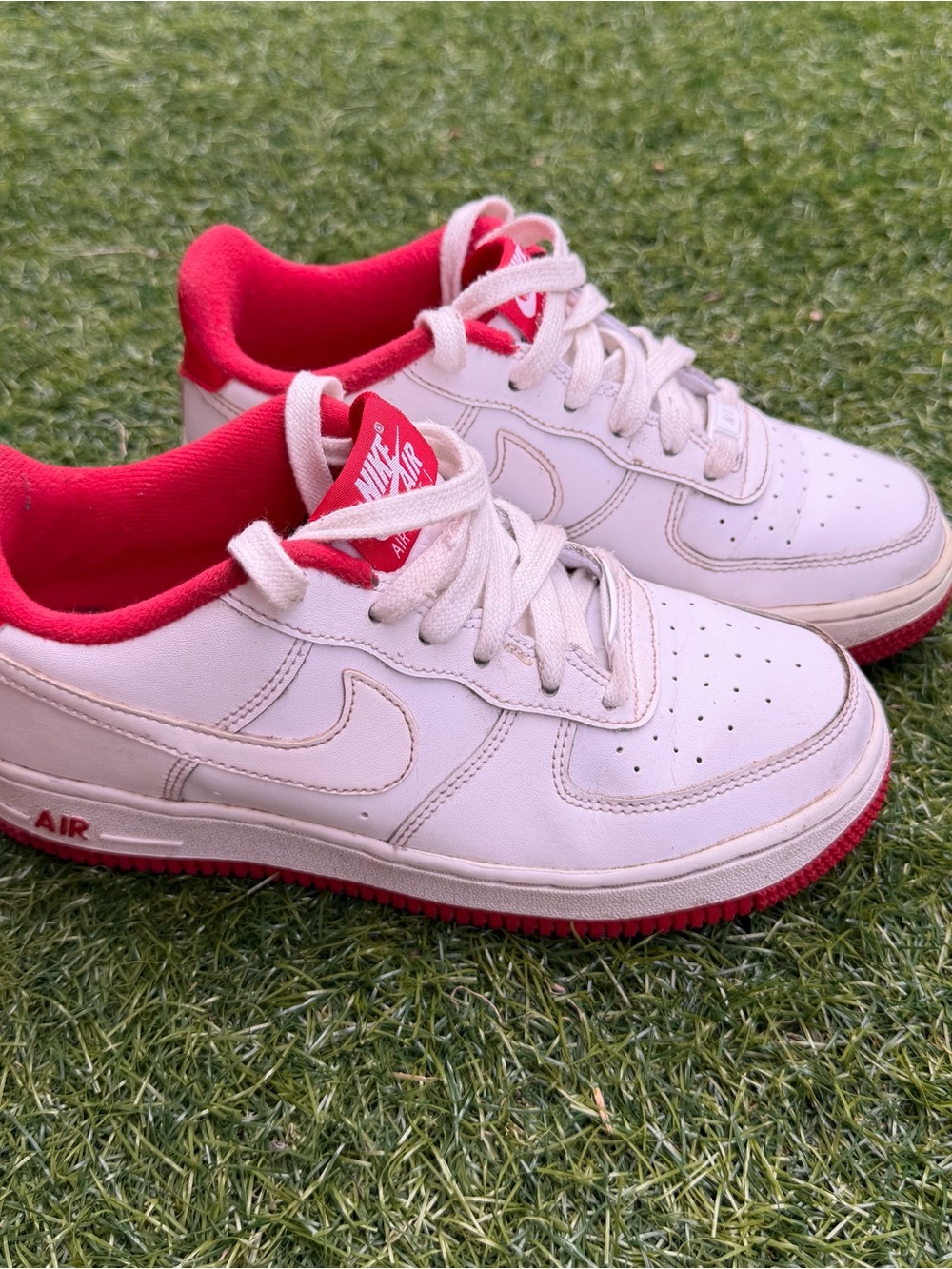 Nike Kids White Sneakers with Red Accents